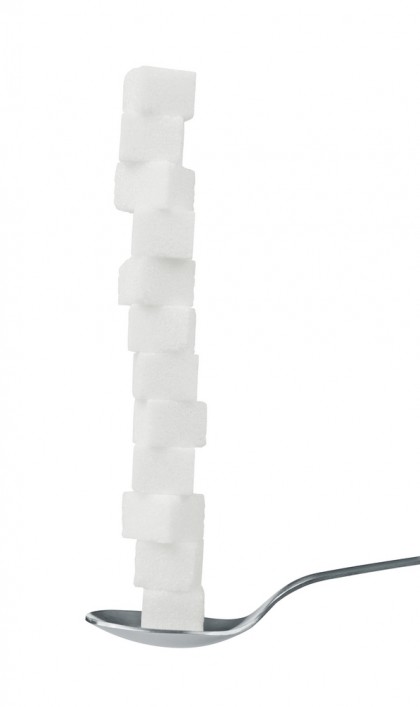 Consumul de zahăr adăugat dublează producția de grăsimi